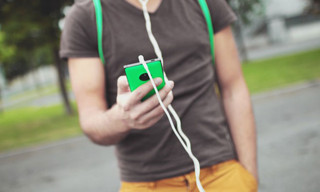 Man listening to music while walking