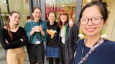 A photo of 5 women stood outside the cxpartners Bristol office